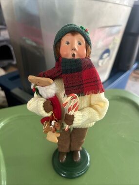 Byers choice Caroler Figurine in Plaid Scarf with gingerbread men. Signed